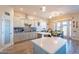 Modern kitchen featuring a large island and ample cabinet space at 26063 N 83Rd Dr, Peoria, AZ 85383