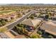 Aerial view of home and surrounding community at 26458 W Yukon Dr, Buckeye, AZ 85396