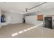 Large garage offering extensive storage options at 26458 W Yukon Dr, Buckeye, AZ 85396