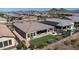 Aerial view of house backyard, patio, and grassy area at 30401 N 115Th Dr, Peoria, AZ 85383