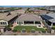 Aerial view of house showcasing backyard, patio, and neighborhood at 30401 N 115Th Dr, Peoria, AZ 85383