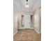 Bright entryway with tile flooring and neutral color palette at 30401 N 115Th Dr, Peoria, AZ 85383