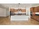 Eat-in kitchen with granite counters and island at 30401 N 115Th Dr, Peoria, AZ 85383