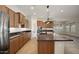 Spacious kitchen, granite island, and ample cabinetry at 30401 N 115Th Dr, Peoria, AZ 85383