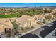 Aerial view of home with desert landscaping adjacent to a golf course at 30626 N 45Th Pl, Cave Creek, AZ 85331