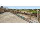 Back patio with stone flooring, metal guardrails, and overlooking desert landscape at 30626 N 45Th Pl, Cave Creek, AZ 85331