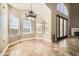 Bright dining area with tall ceilings, lots of natural light, and an elegant chandelier at 30626 N 45Th Pl, Cave Creek, AZ 85331