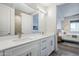 Double vanity bathroom with a view of the bedroom at 3131 N Central Ave # 6015, Phoenix, AZ 85012