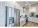 Stainless steel refrigerator and range in a modern kitchen at 3131 N Central Ave # 6015, Phoenix, AZ 85012