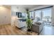 Bright living room with city views, comfortable seating, and large windows at 3131 N Central Ave # 6015, Phoenix, AZ 85012