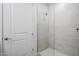 Clean shower with glass enclosure and neutral tile at 3131 N Central Ave # 6015, Phoenix, AZ 85012