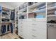 Spacious walk-in closet with ample shelving and drawers at 3131 N Central Ave # 6015, Phoenix, AZ 85012