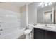 Bathroom with single vanity, tub, and tiled floor at 3167 E Battala Ct, Gilbert, AZ 85297