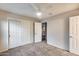 Bedroom with carpet, double-door closet and access to loft area at 3167 E Battala Ct, Gilbert, AZ 85297