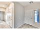 Interior entryway with white door and tile floor at 3167 E Battala Ct, Gilbert, AZ 85297