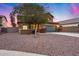 Two-story house with a green garage door and landscaping at 3167 E Battala Ct, Gilbert, AZ 85297