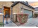 Front view of house with gate and landscaping at 3167 E Battala Ct, Gilbert, AZ 85297