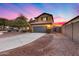 Two-story house with a two-car garage and landscaped yard at 3167 E Battala Ct, Gilbert, AZ 85297