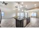 Spacious kitchen featuring an island with granite countertops and stainless steel appliances at 3167 E Battala Ct, Gilbert, AZ 85297