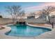 Stunning kidney shaped pool with waterfall feature at 3167 E Battala Ct, Gilbert, AZ 85297