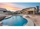 Inviting kidney shaped pool with waterfall feature at 3167 E Battala Ct, Gilbert, AZ 85297