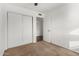 Bedroom with sliding door closet and carpet flooring at 3214 W Grovers Ave, Phoenix, AZ 85053