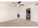 Bright bedroom with ceiling fan and large closet at 3664 E Juanita Ave, Gilbert, AZ 85234