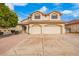 Two-story house with a three-car garage and desert landscaping at 3664 E Juanita Ave, Gilbert, AZ 85234