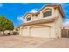 Two-story house with a three-car garage and side yard view at 3664 E Juanita Ave, Gilbert, AZ 85234