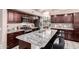 Gourmet kitchen featuring granite countertops and breakfast bar at 3664 E Juanita Ave, Gilbert, AZ 85234