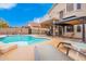 Enjoy the sun on the patio loungers by the refreshing pool at 3664 E Juanita Ave, Gilbert, AZ 85234