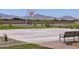 Outdoor basketball court with bench and mountain view at 3811 S 87Th Dr, Tolleson, AZ 85353