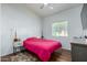 Charming bedroom with pink bedding and wood nightstands at 4202 S 76Th Ln, Phoenix, AZ 85043