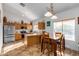 Kitchen with wood cabinets, stainless steel appliances, and an island at 4202 S 76Th Ln, Phoenix, AZ 85043