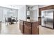 Kitchen island with granite countertop and breakfast nook at 4364 E Turnberry Ct, Gilbert, AZ 85298