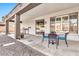 Covered patio with table and chairs, perfect for outdoor dining at 4364 E Turnberry Ct, Gilbert, AZ 85298