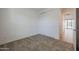 Simple bedroom with neutral walls and carpet flooring at 4641 S Glacier St, Mesa, AZ 85212