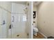 Bathroom with a walk-in shower and toilet at 4644 W Soft Wind Dr, Glendale, AZ 85310