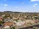 Wide shot of neighborhood with mountain backdrop at 4644 W Soft Wind Dr, Glendale, AZ 85310