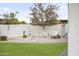 Cozy fire pit area with seating in the backyard at 4644 W Soft Wind Dr, Glendale, AZ 85310