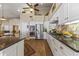 Spacious kitchen featuring stainless steel appliances and granite counters at 4644 W Soft Wind Dr, Glendale, AZ 85310