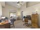 Home office featuring wood desk and window views at 4644 W Soft Wind Dr, Glendale, AZ 85310