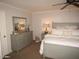 Main bedroom with gray dresser and white bedding at 5154 N 83Rd St, Scottsdale, AZ 85250