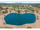 Aerial view of a community lake with surrounding park amenities at 517 N Cambridge St, Gilbert, AZ 85233