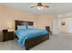 Main bedroom with king-size bed and built-in drawers under the bed at 517 N Cambridge St, Gilbert, AZ 85233