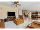 Open living room with a view of the kitchen and dining area at 517 N Cambridge St, Gilbert, AZ 85233