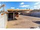 Backyard with covered structure and block wall at 5321 W Country Gables Dr, Glendale, AZ 85306