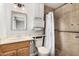 Bathroom with shower, toilet, vanity, and linen storage at 5343 S El Camino Dr, Tempe, AZ 85283