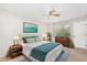 Spacious bedroom with a king-size bed and teal bedding at 5343 S El Camino Dr, Tempe, AZ 85283