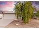 House exterior showcasing a large tree and a spacious driveway at 5343 S El Camino Dr, Tempe, AZ 85283